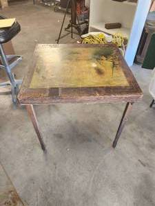 lot 10 image: Vintage table - fireplace screen - made by James E. Stark Company