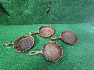 lot 95 image: Selection of cast iron skillets