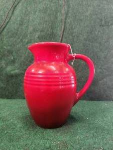 lot 144 image: Red Le Creuset pitcher