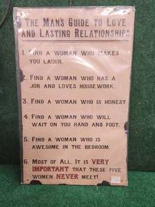 lot 216 image: Humorous metal sign - The mans guide to Love