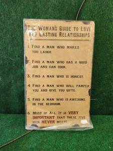 lot 238 image: Humorous metal sign - The womans guide to love