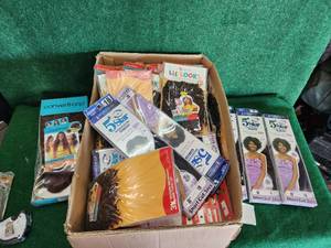 lot 311 image: Box of wigs