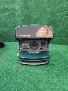 lot 354 image: Polaroid camera in soft case