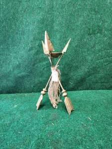 lot 382 image: Arrow tripod candle holder