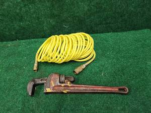 lot 403 image: Rigid 14 pipe wrench and air hose