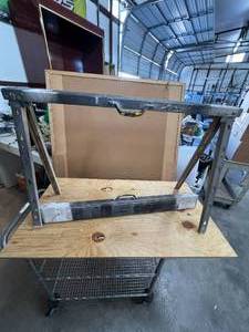 lot 580 image: Pair of metal foldable saw horses
