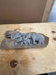 lot 592 image: Elephant on wood - cast material - designed to look carved on wood