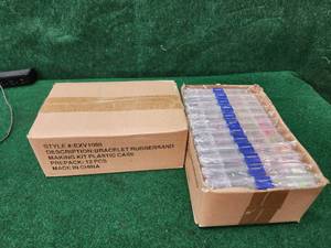 lot 278 image: Selection of 2 boxes of 12 rubber band bracelet making kits