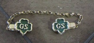 lot 249 image: GIRL SCOUT four leaf clover shirt pin