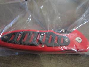 lot 312 image: black and red knife
