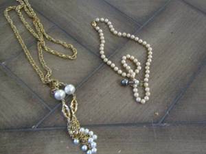 lot 22 image: pearls necklace, gold necklace