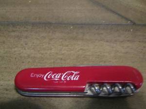 lot 388 image: Coca-cola multi tool pocket knife