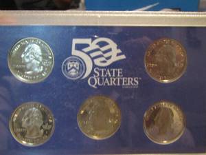 lot 413 image: 50 QUARTER SET - 2000 Year QUARTERS  IN CASE  CONTAINS 5 QUARTERS