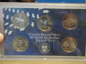 lot 387 image: 1999 Quarters  IN CASE qty 5