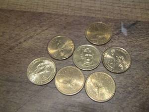lot 410 image: Gold  ONE DOLLAR COINS Qty 7