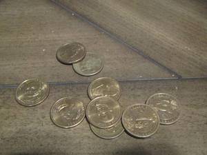 lot 409 image: Gold ONE DOLLAR COINS  QTY 9