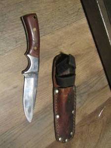 lot 374 image: Hunting knife in sheath wood handle  4BLADE