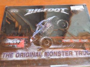 lot 104 image: Bigfoot original monster truck metal artsign