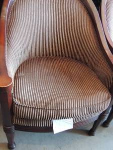 lot 112 image: EASY CHAIR by Broadmoore with clips and cushion has a tear