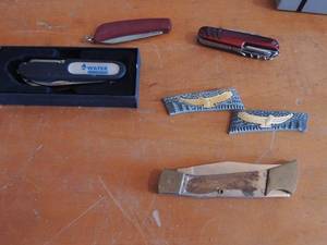 lot 129 image: Assorted pocket knifes- National water use- NIB pocket knife- small red single blade