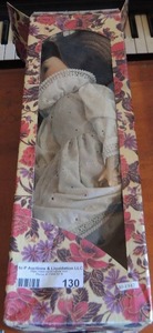 lot 130 image: baby doll in box