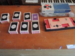 lot 135 image: playing cards, duplicate bridge boards