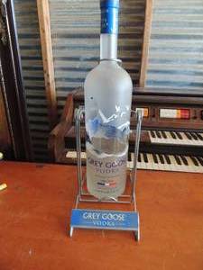 lot 426 image: Grey Goose Vodka bottle IN a Bottle swinging Cradle