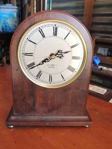 lot 149 image: Alex ivy quartz clocks by Bombay co., missing front glass cover