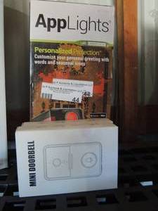 lot 44 image: app light 2 mini doorbells nib