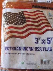 lot 51 image: a 3 x 5 Veteran worn USA Flag
