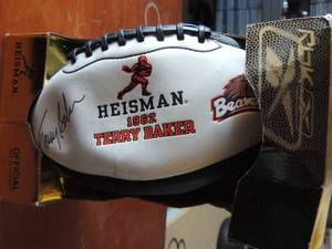 lot 17 image: HEISMAN FOOT BALL  1962 SIGNED BY  Terry Baker 1962 WINNER  - HE PLAYED FOR OREGON STATE