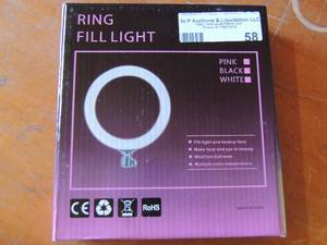 lot 58 image: RING LIGHT  a black white and pink ring fill light nib