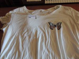 lot 95 image: White cotton shirt with small bluepurple butterfly on the front and big butterfly on the back of shirt NEW
