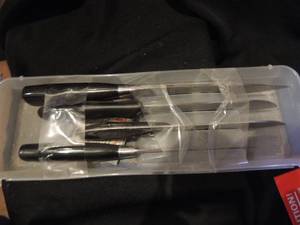 lot 352 image: J A HENCKELS  TWIN  4 STAR KNIVES - SET OF 4 -  5, 6, 7, 8  -NOTE DAMAGE TO HANDLE SOF 5  & 7