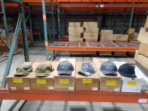 lot 82 image: Large Lot of Hats.  6 Cases Total - BID IS PER CASE