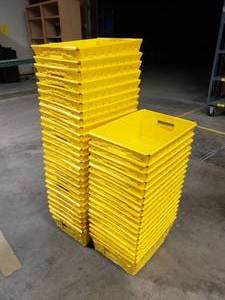 lot 42 image: Lot of 44 Yellow Uline Space Age Totes