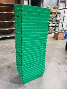 lot 44 image: Lot of 29 Green Uline Space Age Totes