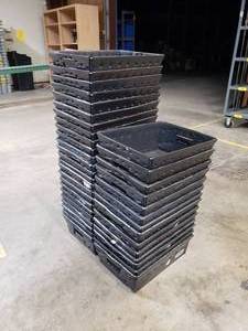 lot 45 image: Lot of 38 Black Uline Space Age Totes