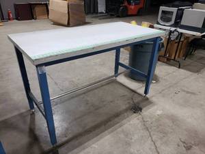 lot 50 image: Global Industries Adjustable Height Workstation.  Top Measures 60 x 30