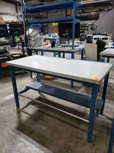 lot 79 image: Global Industries Adjustable Height Workstation. Top Measures 60 x 30