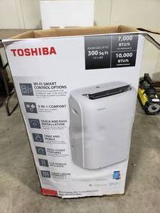 lot 102 image: toshiba RAC-PD1013CWRU Portable Air Conditioner.  BLOWS COLD