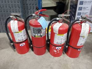 lot 113 image: Lot of 4 20lb Fire Extinguishers.  Badger & Sentry