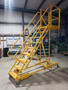 lot 116 image: TRI-ARC Rolling Cantilever Ladder w Locking Casters