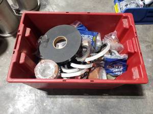 lot 137 image: Tub of Misc Insulation Items.  Includes Foam Sealatn Tape, Polyimide Tape & More.  Tub Included.