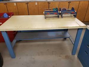 lot 216 image: Global Industries Adjustable Height Work Table w Laminate Top w 2 Powerseal Tape Dispensers Attached.  Top Measures 60 x 30