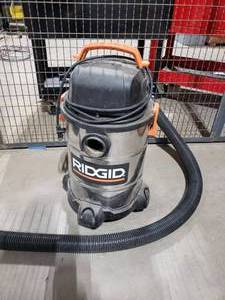 lot 256 image: Ridgid 6 Gallon WetDry Shop Vac.  Model WD64250