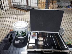 lot 304 image: Lot of Misc Gun Cleaning Supplies.  Includes Hoppes Gun Cleaning Kit, Frog Lube, Upper Receiver Clamp & More