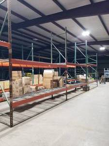lot 312 image: 3 Sections of Industrial Pallet Racking.  Each Section is 126 x 42 & Includes Heavy Duty Wire Racking.  2 Vertical beams are 12 tall and the other 2 are 14 tall.