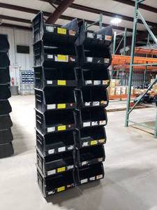 lot 328 image: Stack of 16 Uline S-12422 Black Stackable Bins.  Each Bin Measures 18 x 16.5 x 11