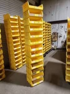lot 368 image: Stack of 12 Uline S-12420 Yellow Stackable Bins.  Each Bin Measures 15 x 16.5 x 7.  Also might be a few Akro Bins, Global or Quantum bins mixed in but they are all the same dimensions.